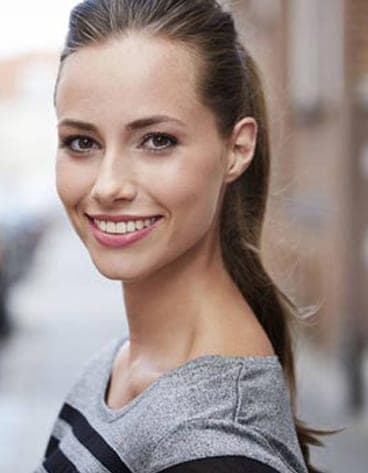 a brunette with a beautiful smile